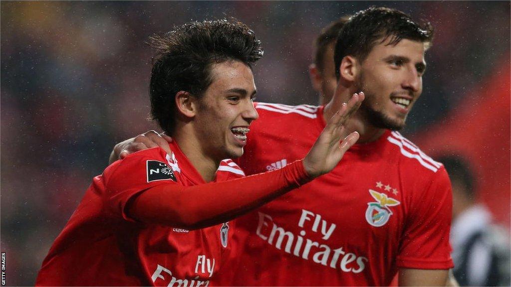 Joao Felix and Ruben Dias celebrate a goal