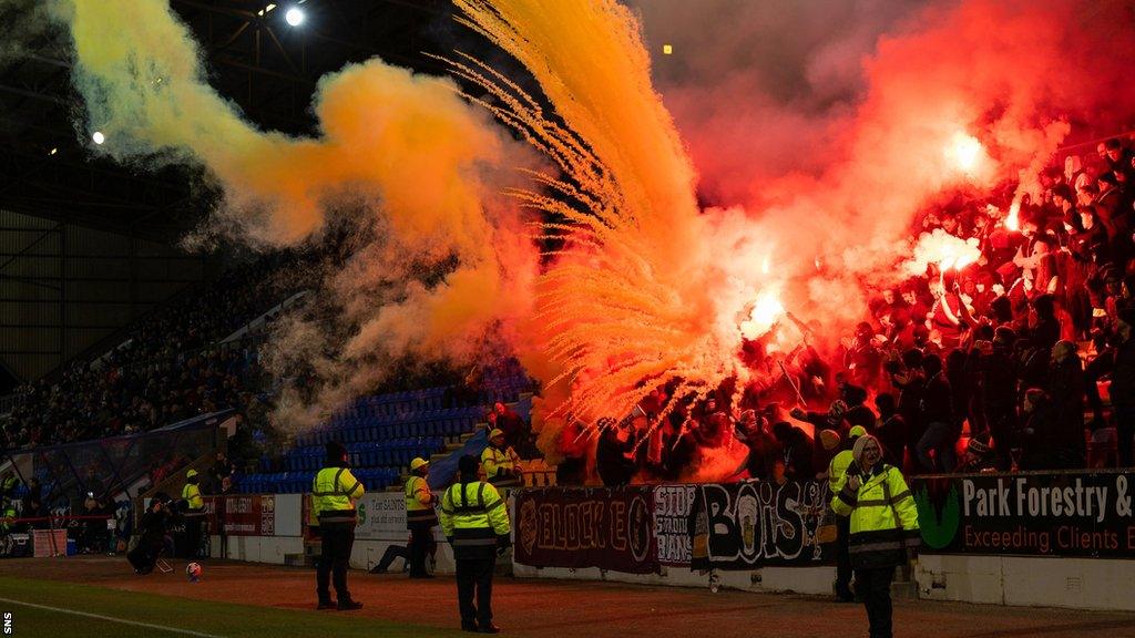 Motherwell fans let off flares