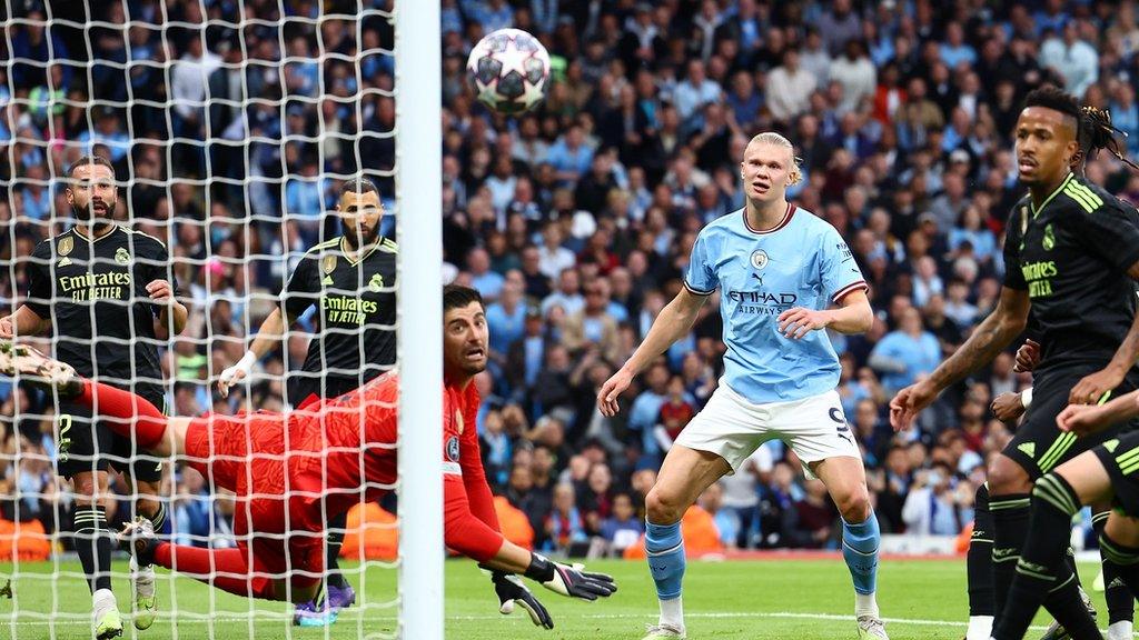 Thibaut Courtois saves from Erling Haaland