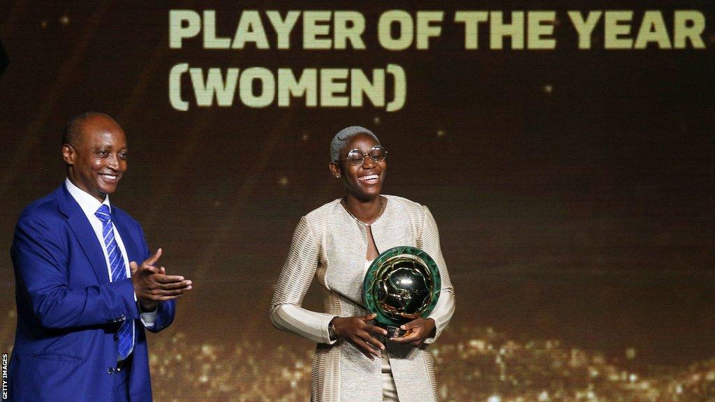 Asisat Oshoala (left) and Patrice Motsepe