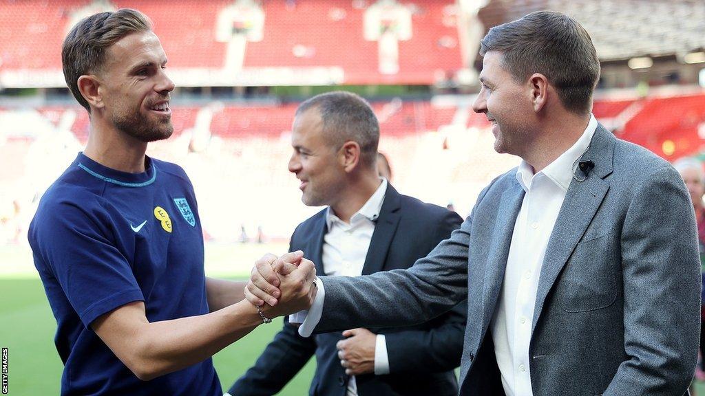 Jordan Henderson (left) and Al-Ettifaq manager Steven Gerrard