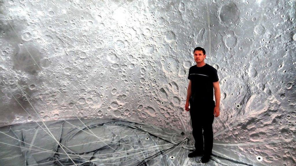 Artist Luke Jerram inside the moon balloon