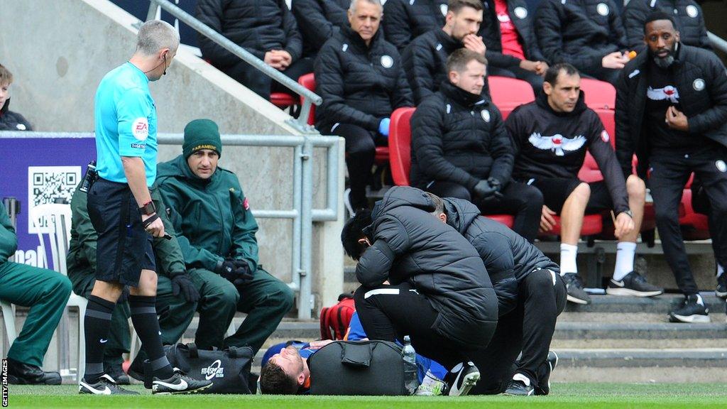 Gary Madine was injured in the opening minute of the game at Bristol City