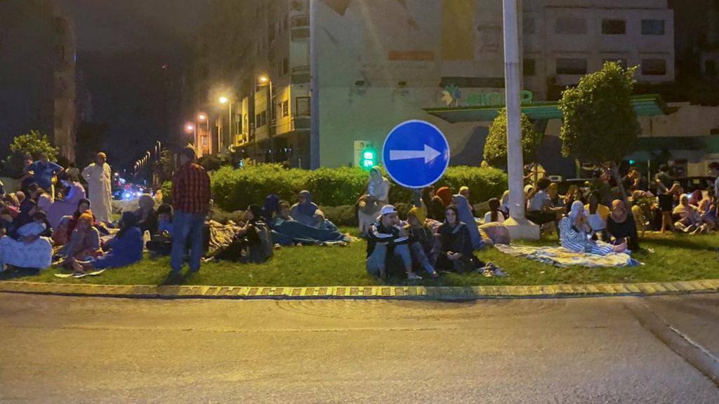 People gather on a street in Casablanca, following a powerful earthquake in Morocco