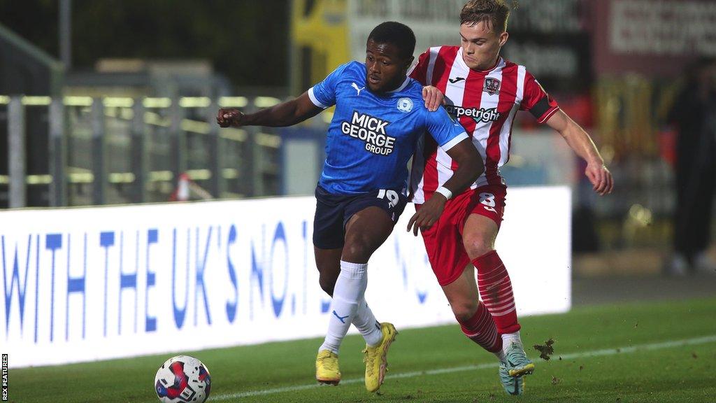 David Ajiboye (left) in action for Peterborough