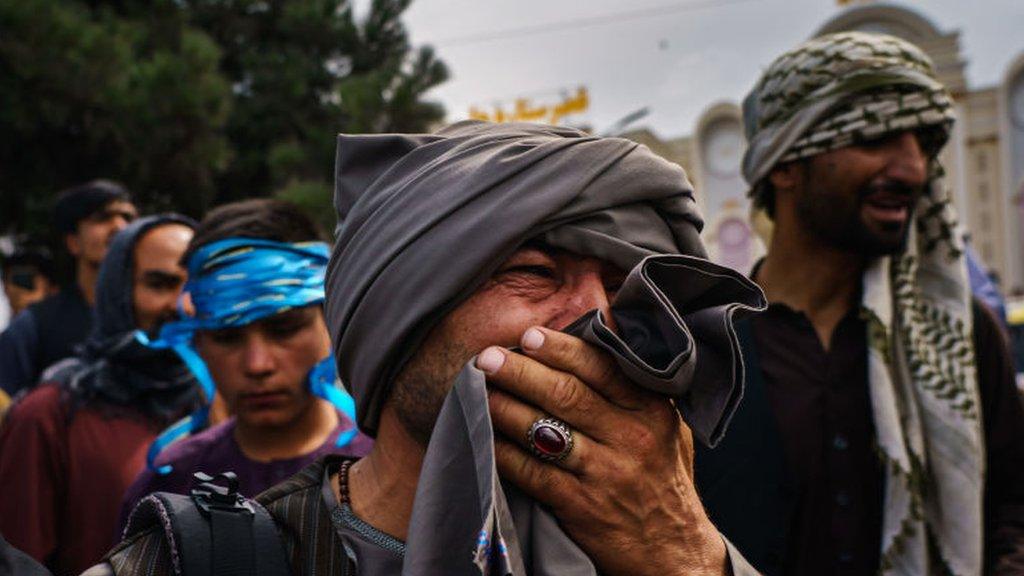 Afghans outside Kabul airport on 17 August 2021