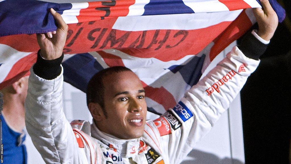 Lewis Hamilton celebrates winning first title