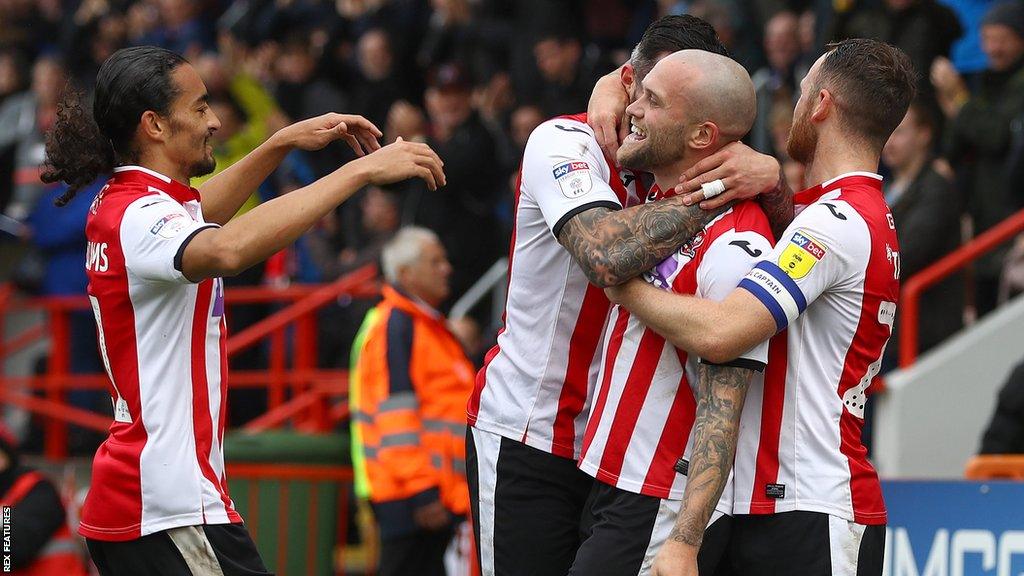 Exeter City celebrate a goal