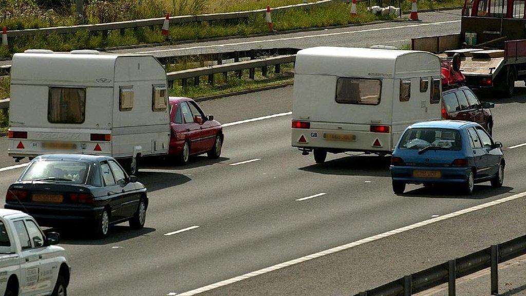 Caravans being towed on a motorway