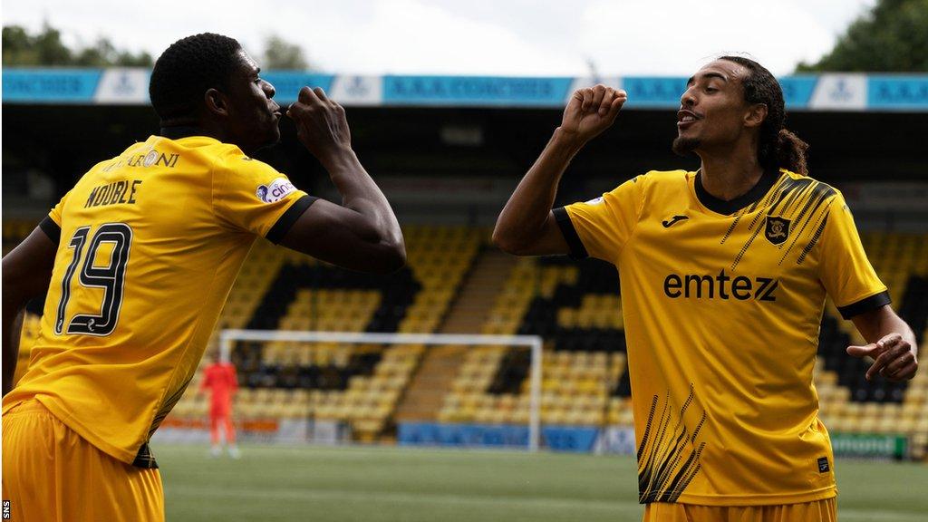 Livingston's Joel Nouble and Kurtis Guthrie celebrate