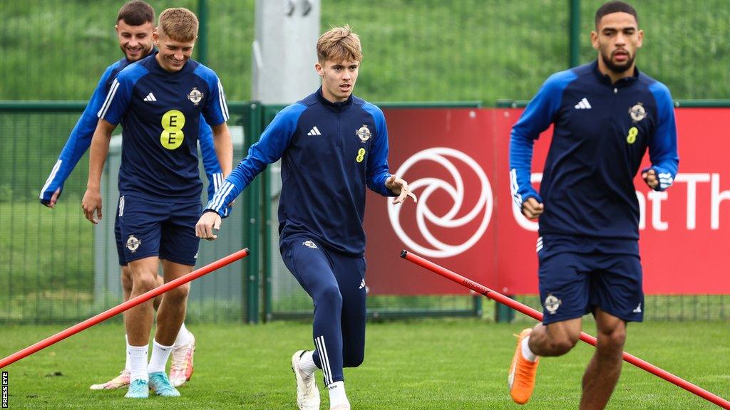 Callum Marshall (left), Isaac Price (centre) and Brodie Spencer (right) are three of the teenagers in Michael O'Neill's squad