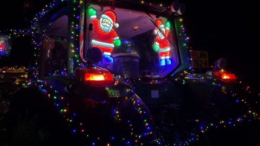 The annual parade sees 50 tractors decked out in dazzling decorations take to the roads for charity.