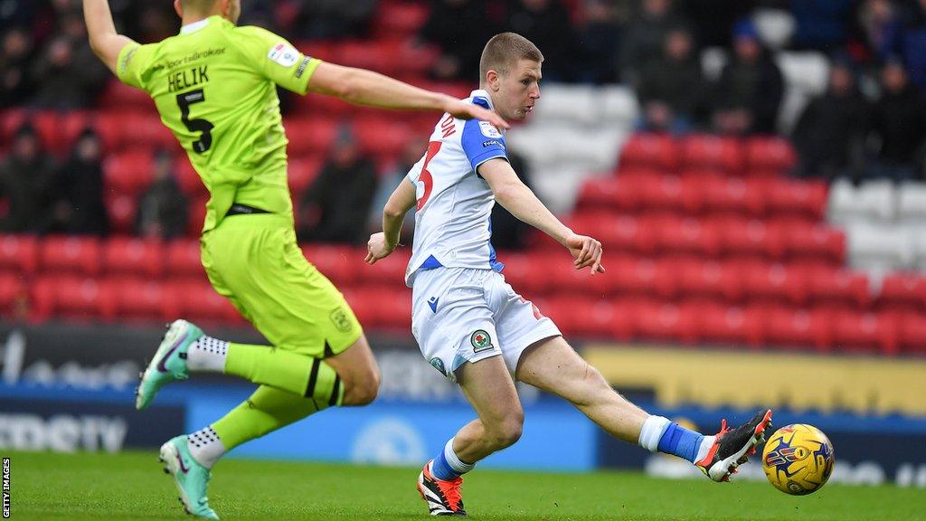 Blackburn Rovers' Adam Wharton scores