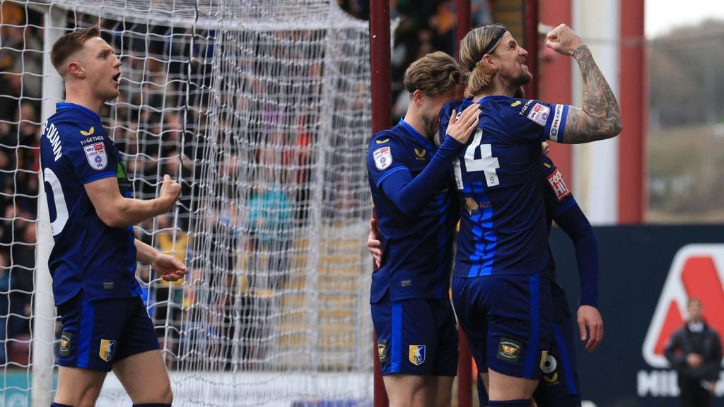 Mansfield Town players celebrating