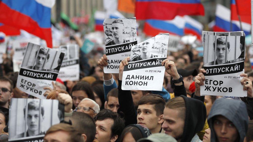 Participants of the Russian liberal opposition hold portraits of arrested activists during a rally in the centre of Moscow, Russia on 10 August 2019.