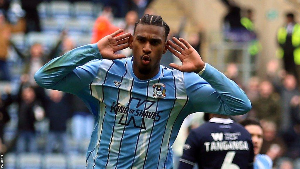 Haji Wright celebrates