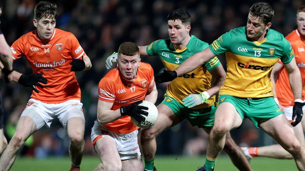 Armagh's Ross McQuillan attempt to evade Donegal's Brendan McCole and Hugh McFadden in last year's Division One meeting between the counties