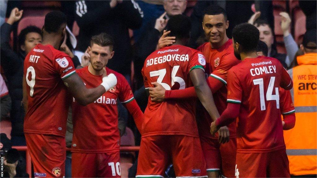 Walsall celebrate Emmanual Adeboyega's winner against Mansfield