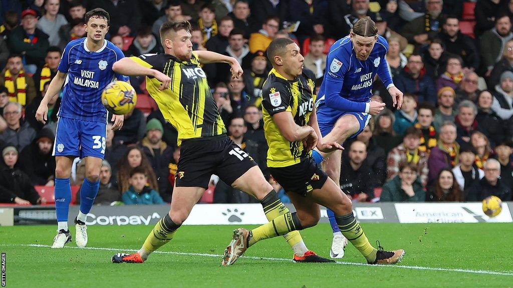 Bowler's shot gives Cardiff the lead - this is an excellent photo of him shooting with two defenders trying to challenge