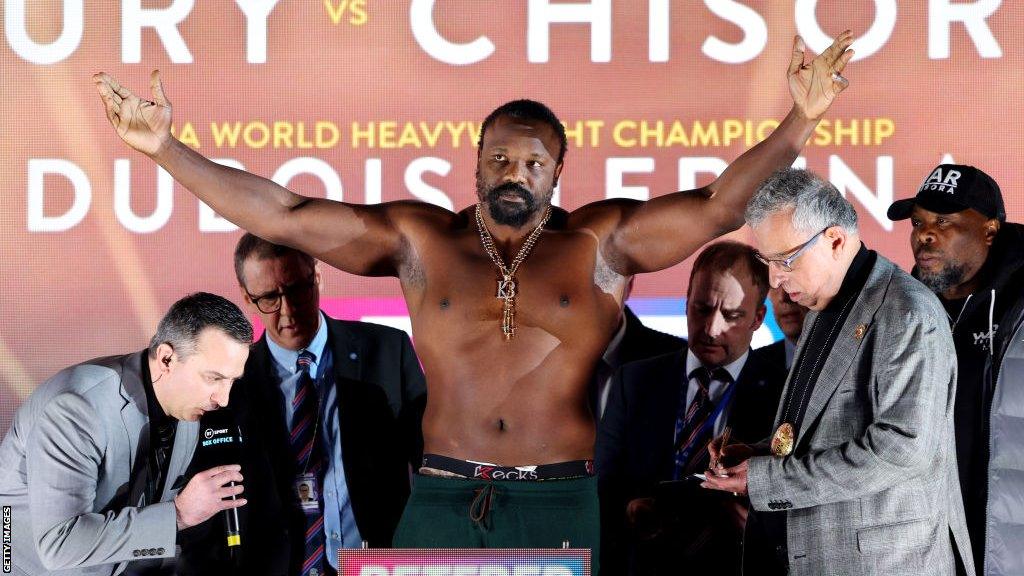 Derek Chisora on the scales