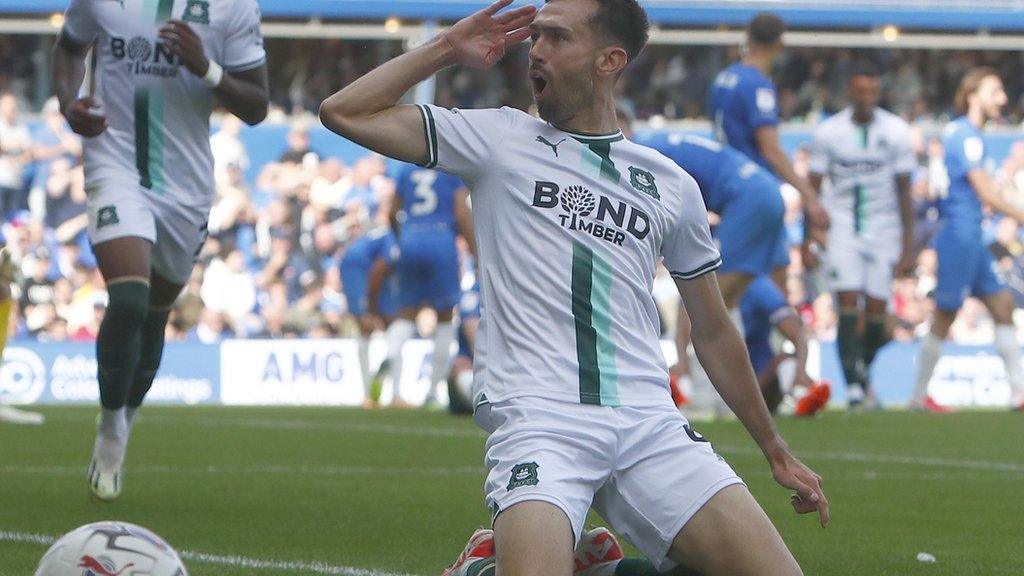 Plymouth striker Ryan Hardie salutes his third goal in five games this season