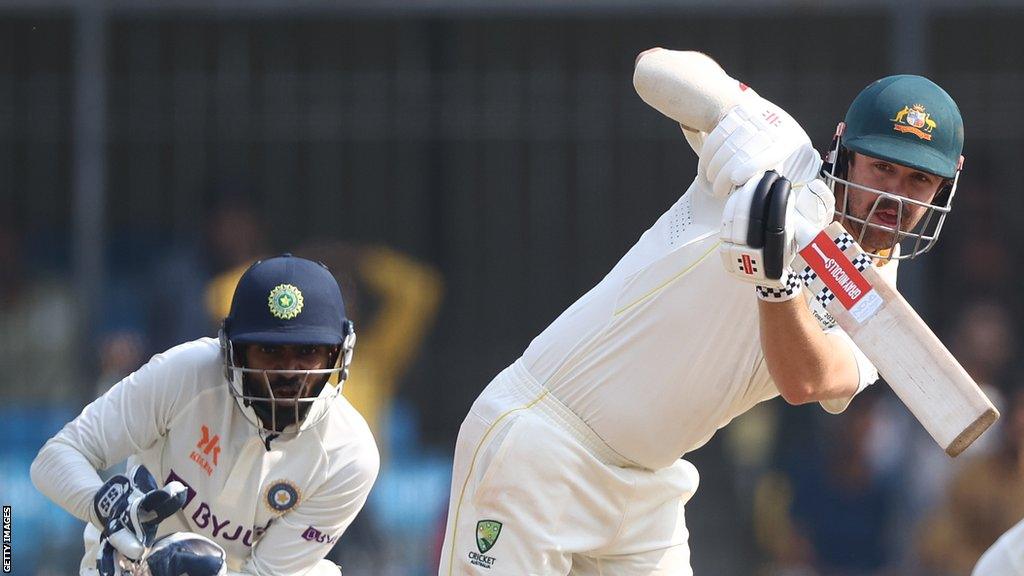 Australia's Travis Head plays a shot against India