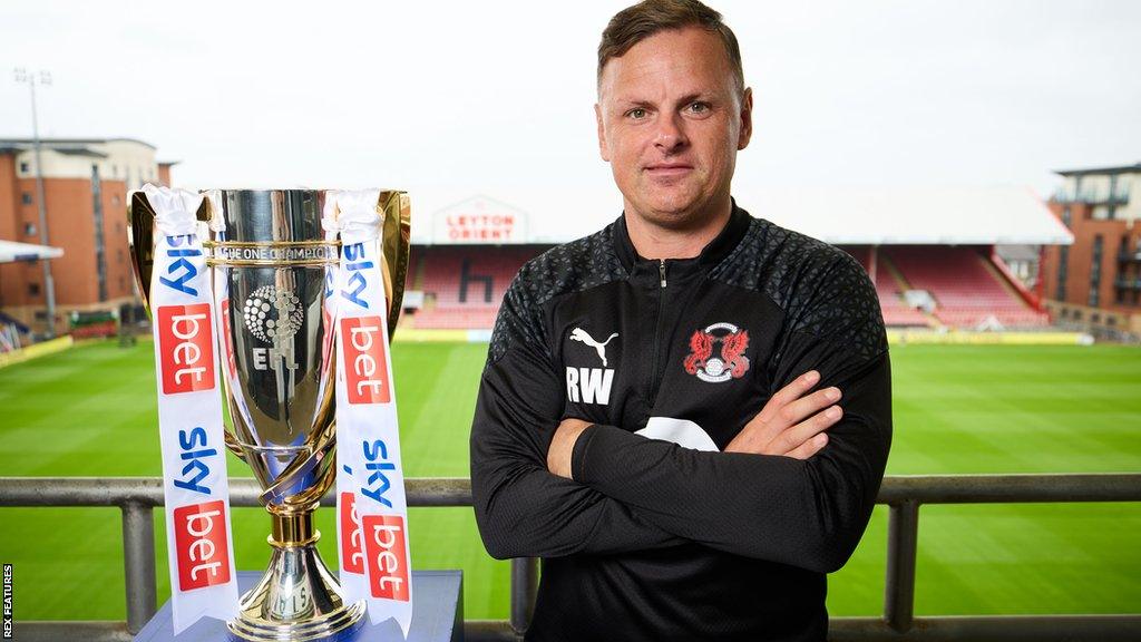 Leyton Orient manager Richie Wellens with the League One trophy at Brisbane Road