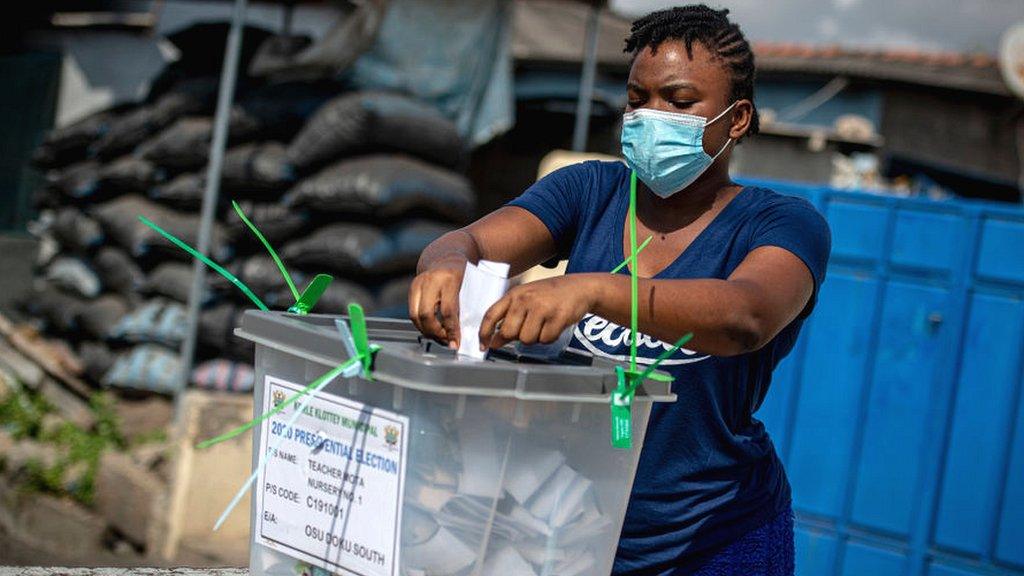 Woman voting in Accra on 7 December