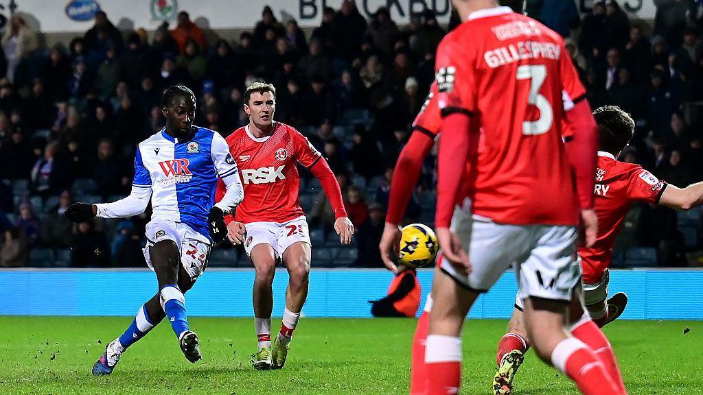 Moussa Baradji shoots through Charlton players to score Blackburn's second goal to draw level with the Addicks