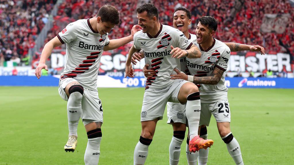 Granit Xhaka celebrates scoring against Frankfurt