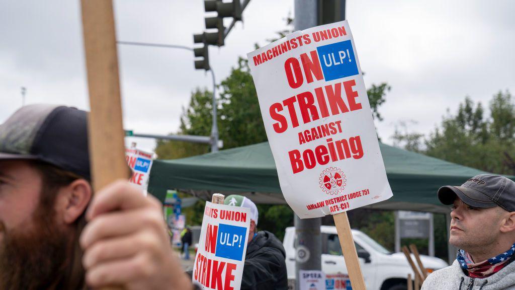 Workers picket outside a Boeing Co. facility during a strike in Everett, Washington, US, on Monday, Sept. 16, 2024. 