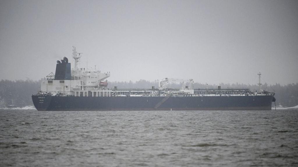 A photo of Eagle S ship from a distance on a grey and cloudy day.