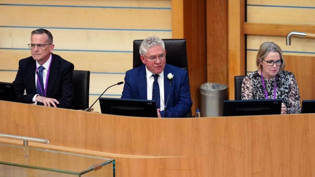 People sitting in the Scottish Parliament