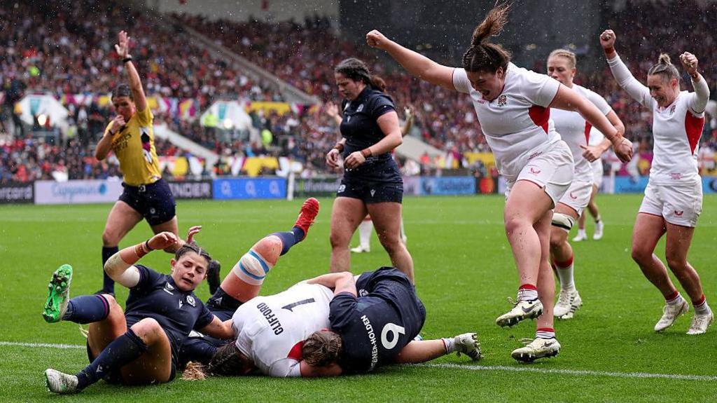 Kelsey Clifford scores a try for England against Scotland