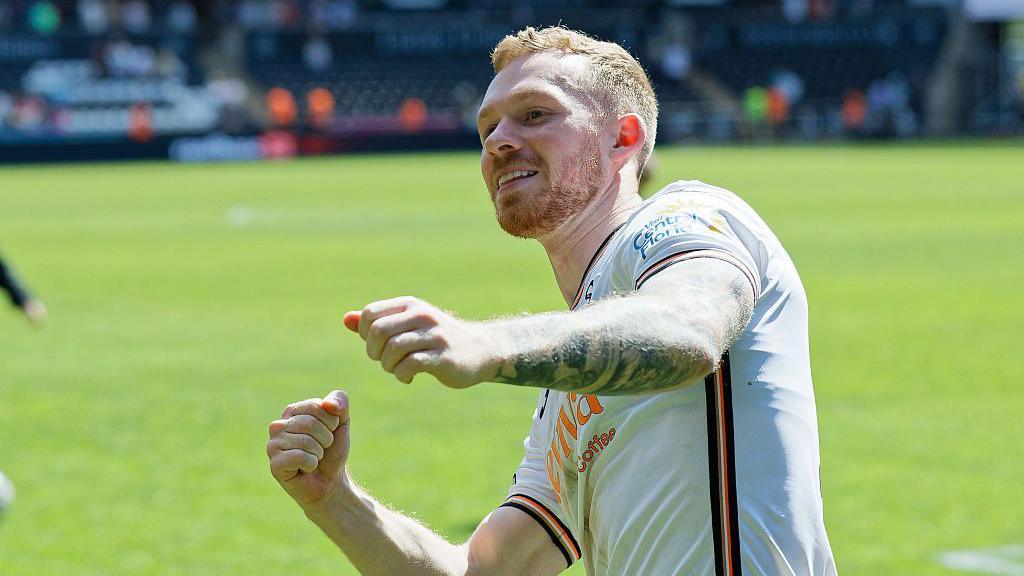 Lewis O'Brien celebrates
