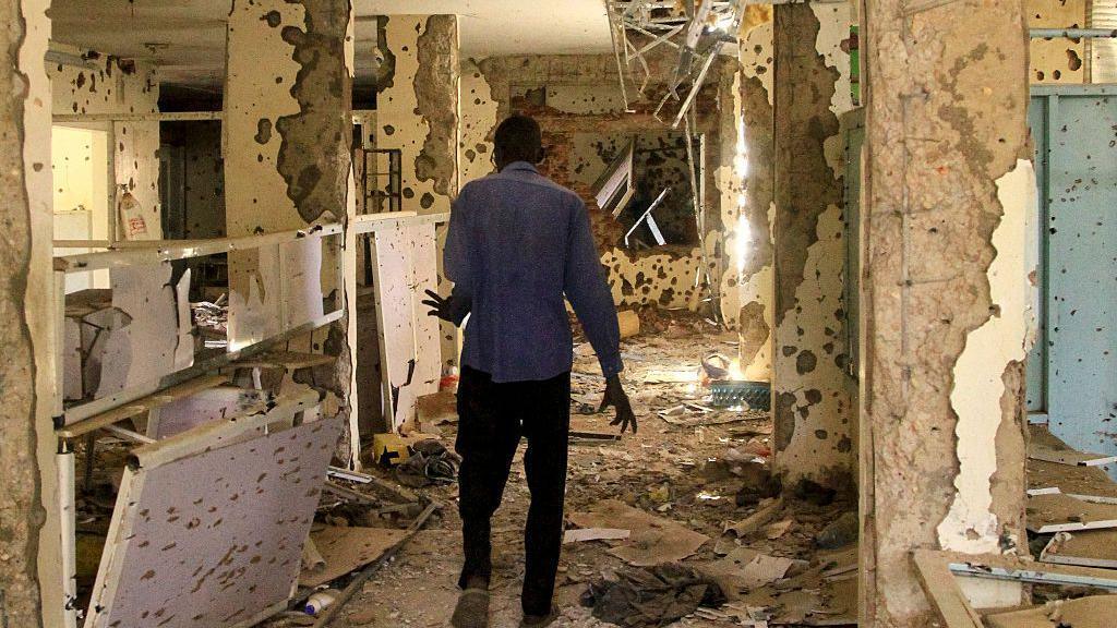 A destroyed hospital in Khartoum in 2023 that is riddled with bullet holes.