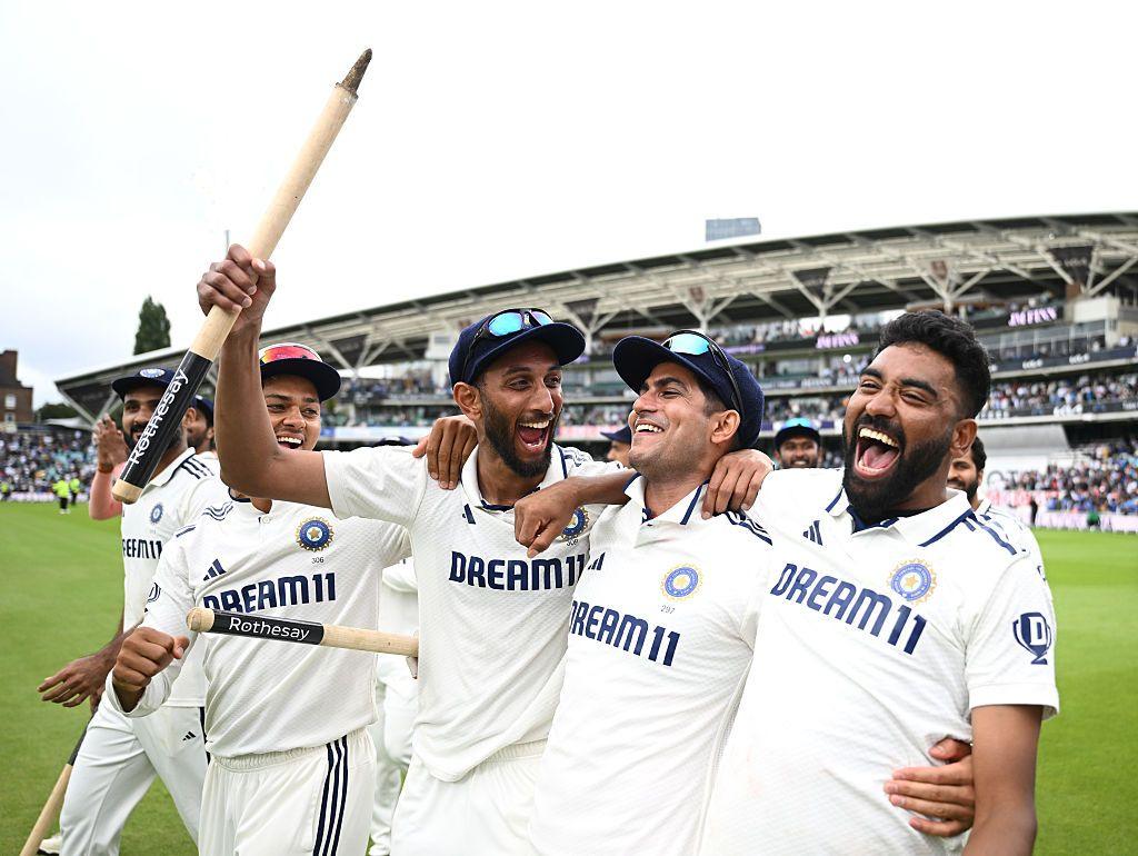 India's Shubman Gill celebrates with teammates Mohammed Siraj and Prasidh Krishna after winning the match on day five of the 5th Rothesay Test Match at The Kia Oval. Photo by Gareth Copley