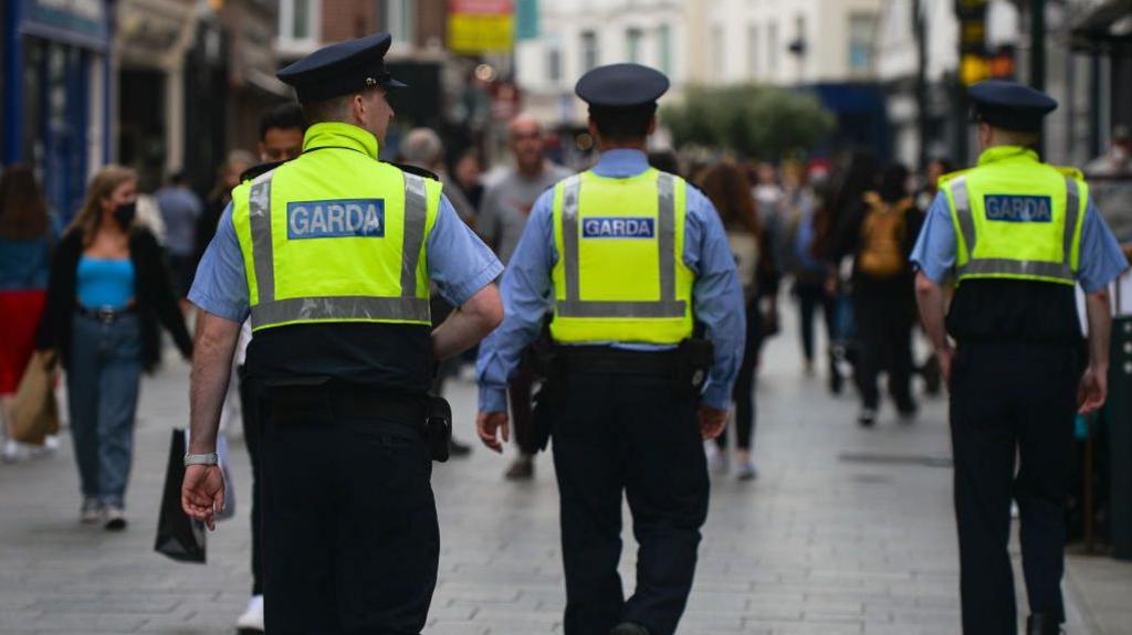 Three Garda officers patrolling Dublin city center in 2021