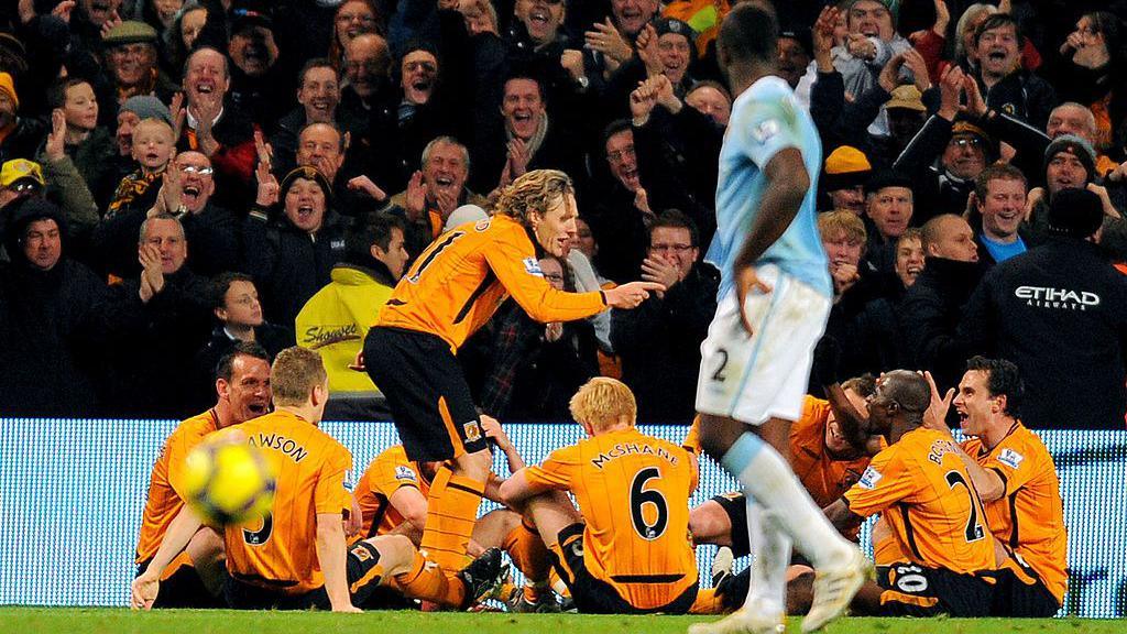 Jimmy Bullard recreates Phil Brown's team talk on the Etihad Stadium pitch during Hull City's Premier League match at Manchester City