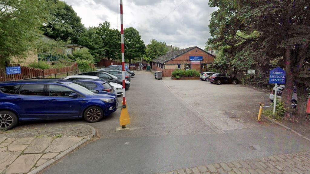 A Google Maps image of the Abbey Grange Medical Centre car park.