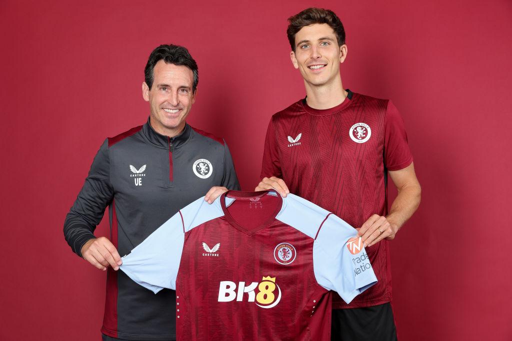 Unai Emery and Pau Torres hold Aston Villa shirt