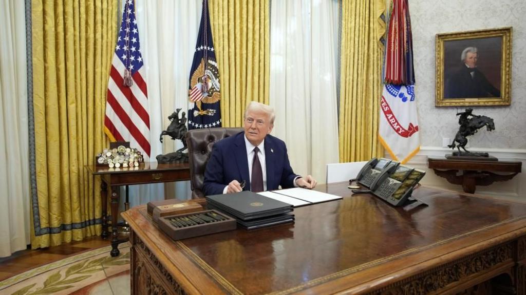 President Donald Trump signs executive orders