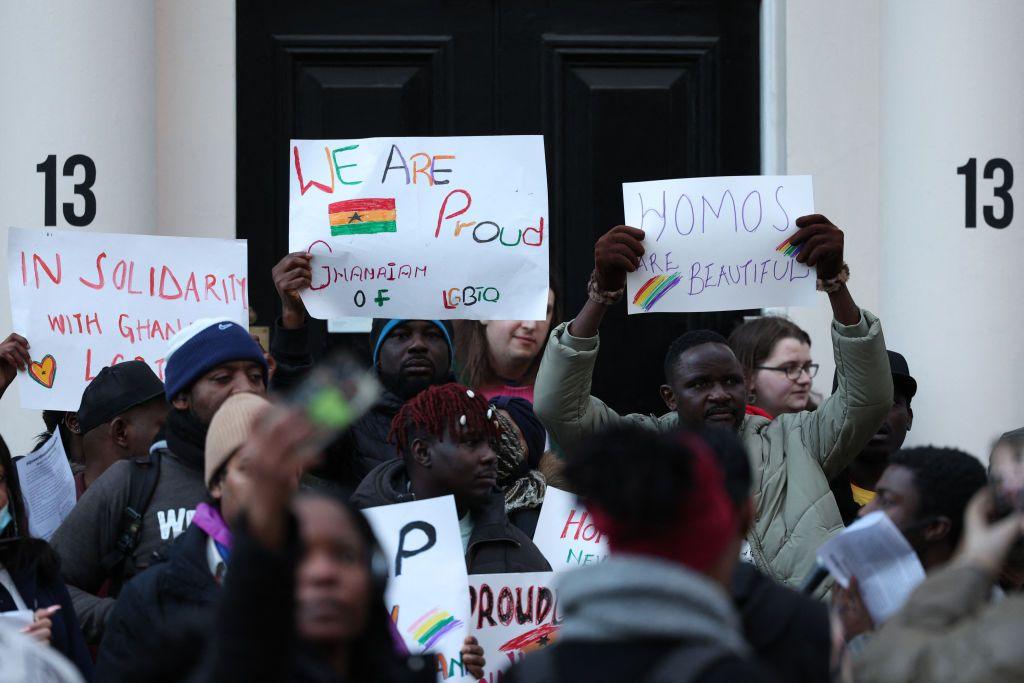 Dozens of protestors stand outside the Ghanian embassy in London holding placards against the anti-LGBTQ+ bill