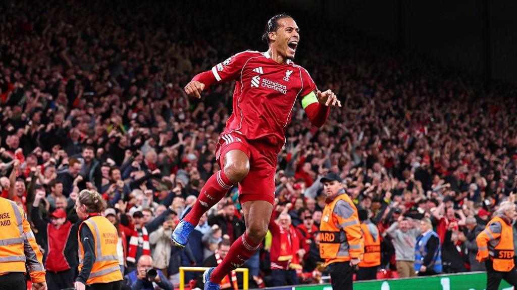 Virgil van Dijk celebrates