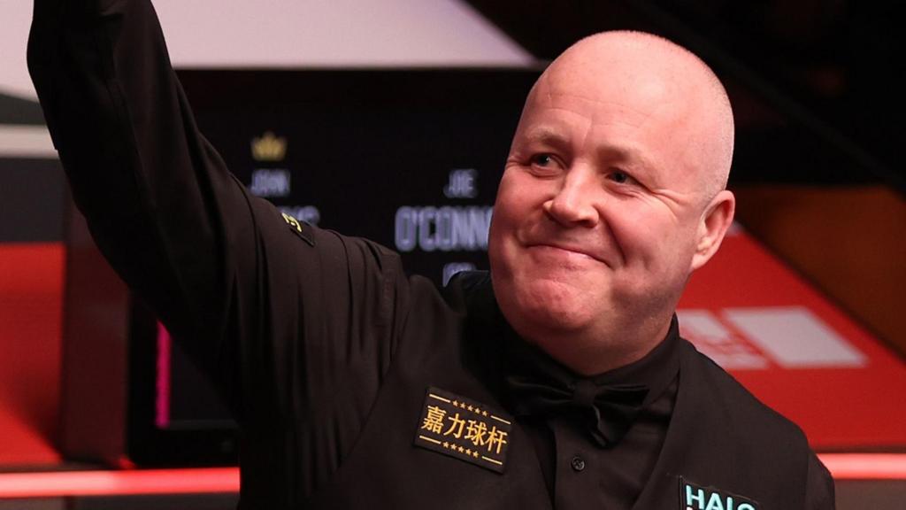 Emotionally ‘drained’ Higgins defeats O’Connor to advance