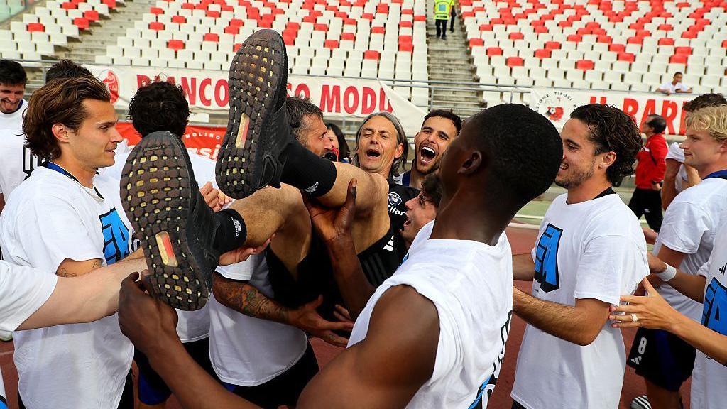 Filippo Inzaghi and Pisa's players celebrate promotion to Serie A