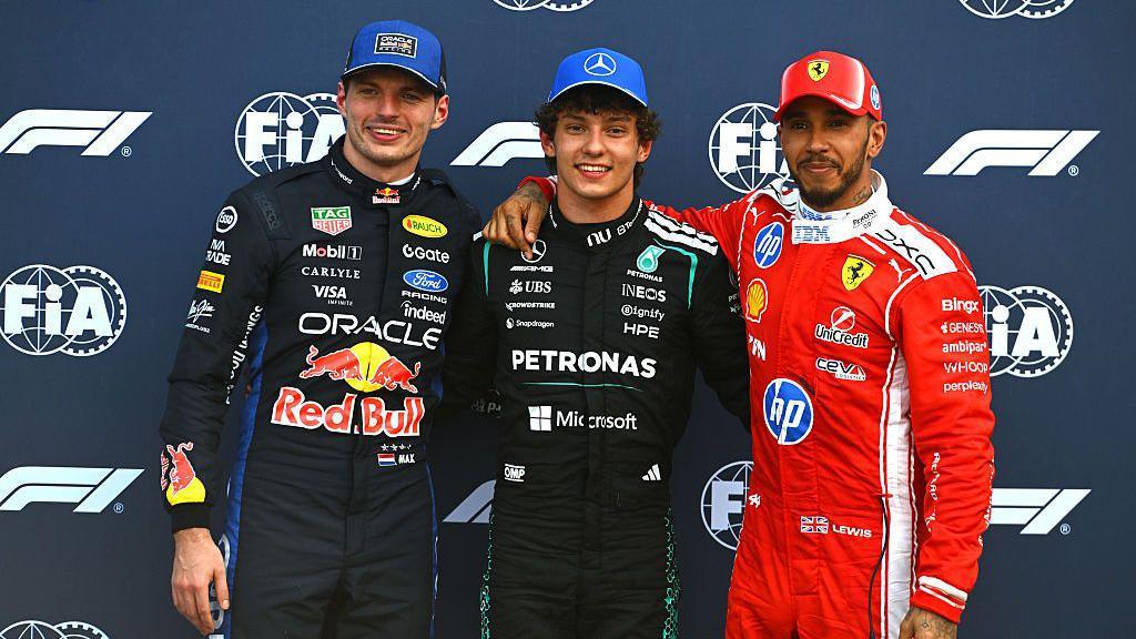 Max Verstappen, Kimi Antonelli and Lewis Hamilton pose for pictures after the Monaco Grand Prix qualifying session