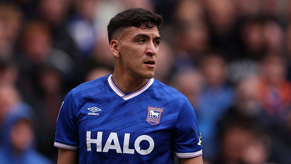 Marcelino Nunez in a blue Ipswich shirt