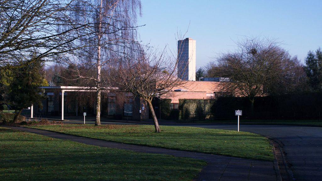 A long view of the modernist brick main crematorium building