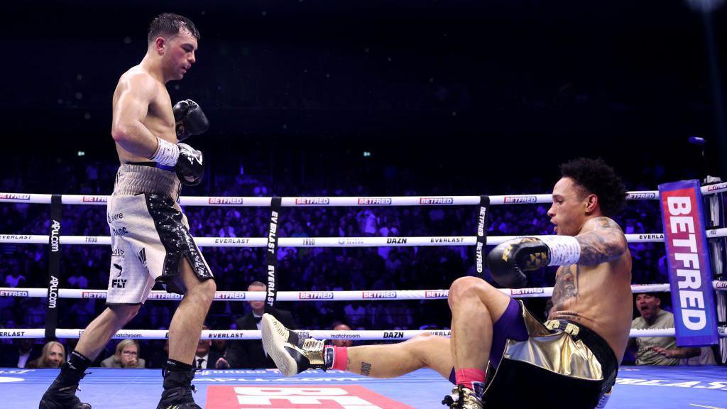 Jack Catterall knocks down Regis Prograis at Co-Op Live in Manchester